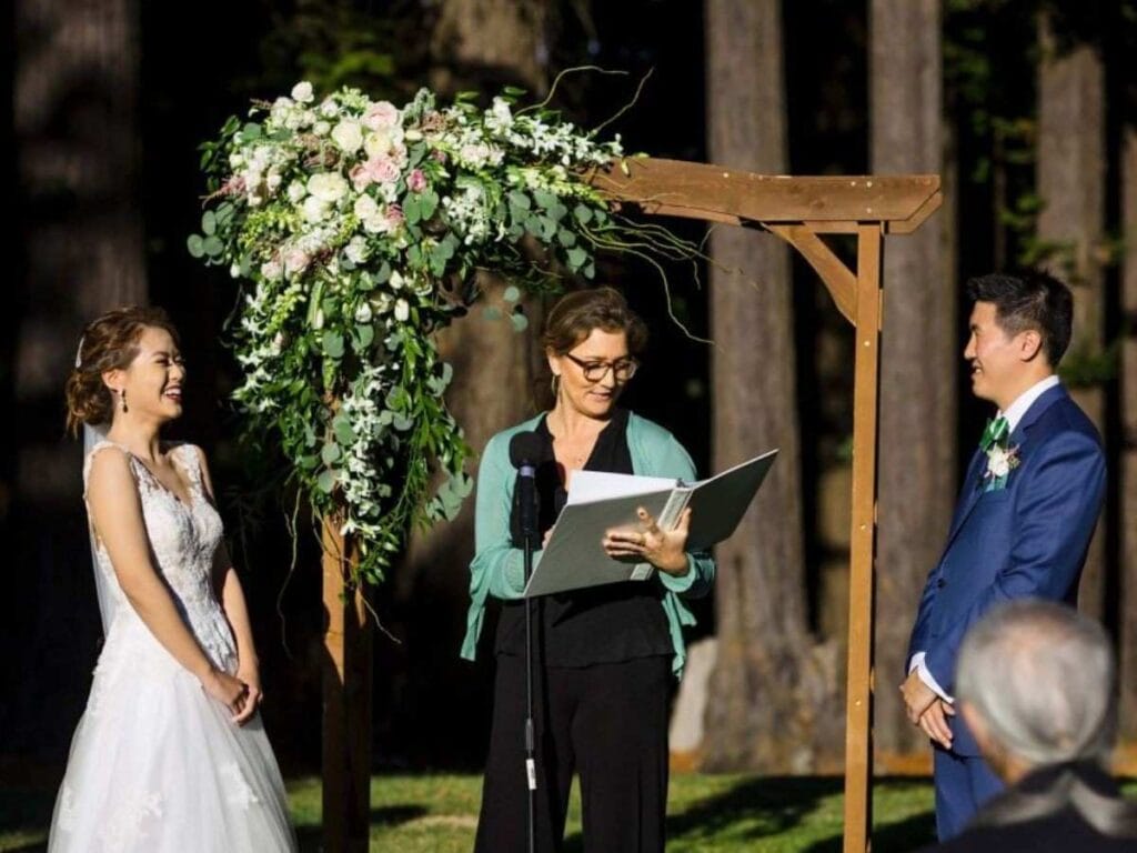 Bride and groom during an outdoor wedding ceremony.
