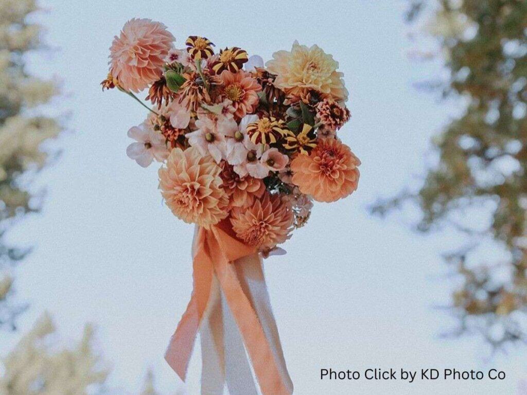 Bridal bouquet with peach and pastel flowers