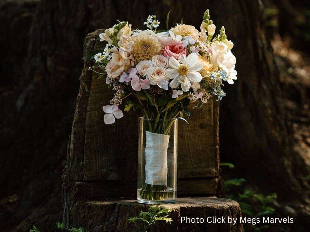Floral centerpiece with soft pastel flowers