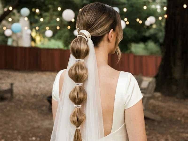 Ultra-realistic luxury bridal editorial photography of a beautif